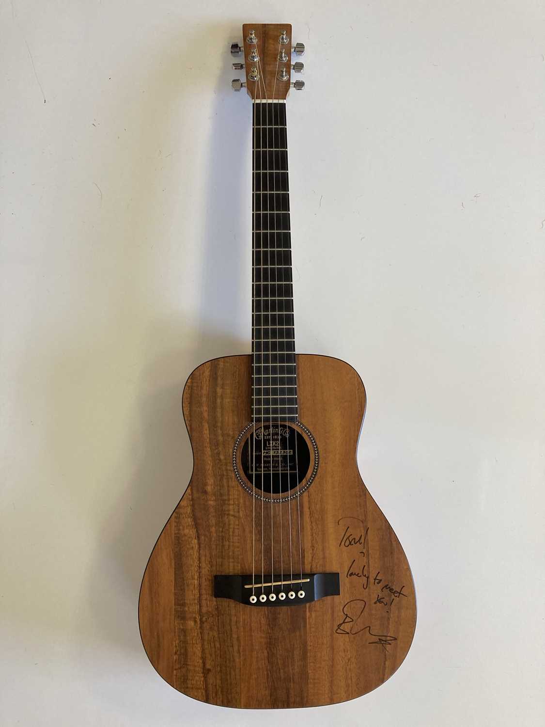 Lot 618 ED SHEERAN SIGNED AND USED GUITAR.