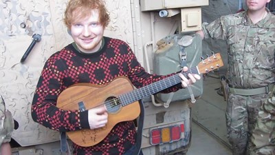 Lot 618 - ED SHEERAN SIGNED AND USED GUITAR.