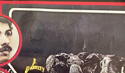 Lot 404 - CARLOS SANTANA SIGNED POSTER.