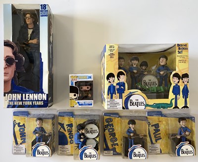 Lot 489 - THE BEATLES FIGURINES AND TOYS IN BOXES.