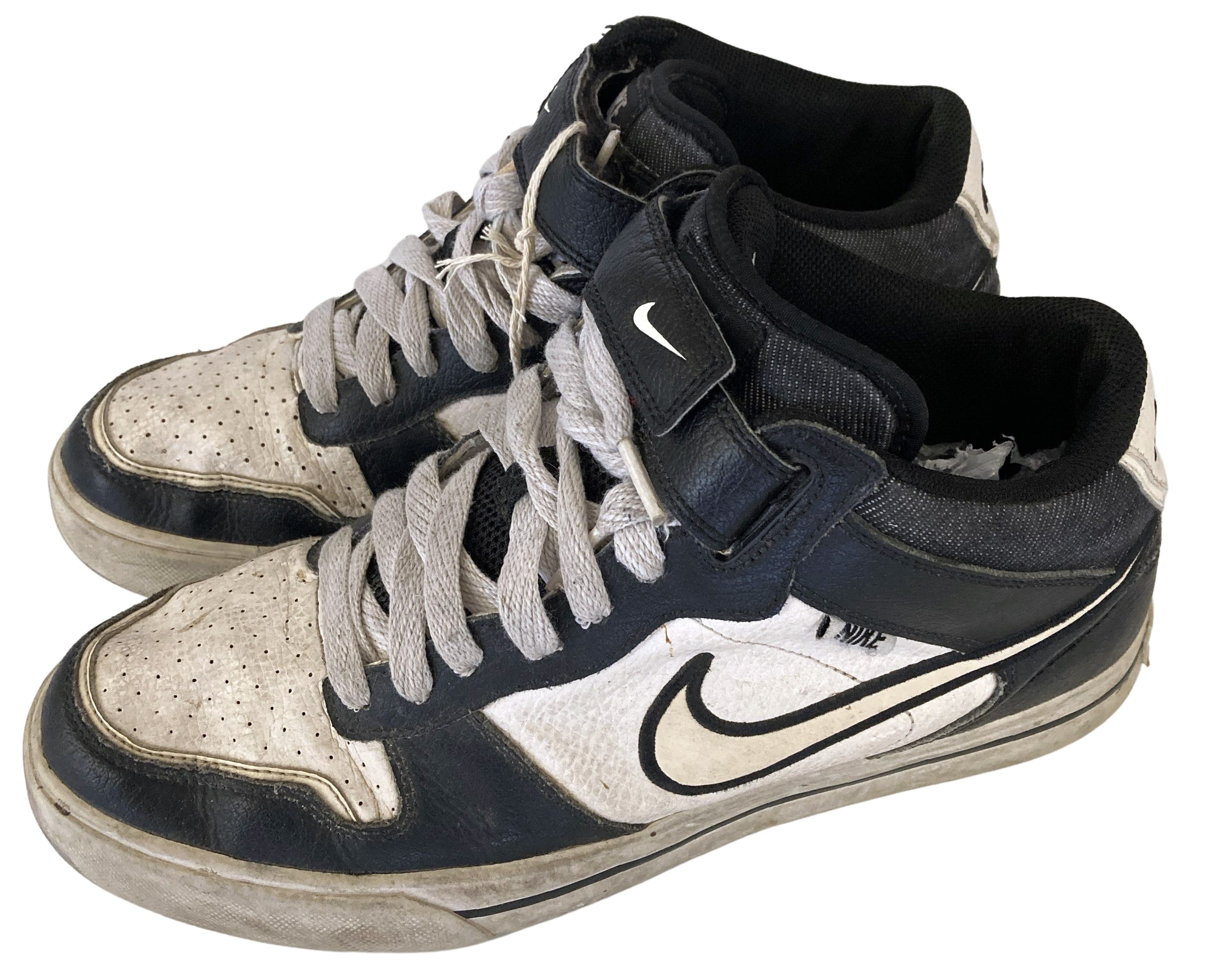 Lot 612 - ED SHEERAN'S OWNED AND WORN NIKE TRAINERS.