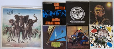 Lot 448 - ELVIS COSTELLO SIGNED RECORDS.