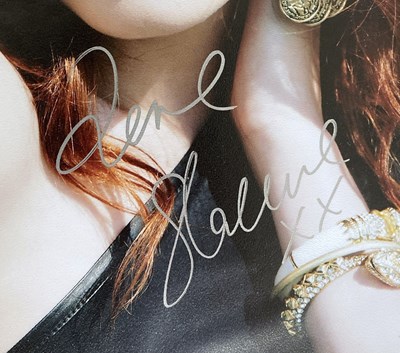 Lot 451 - FLORENCE AND THE MACHINE SIGNED ITEMS.