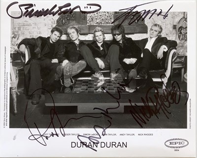 Lot 185 - DURAN DURAN SIGNED PROMO PHOTO.