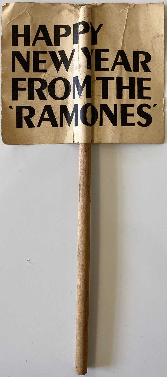 Lot 513 - THE RAMONES - HAPPY NEW YEAR ORIGINAL 1977 MINI SIGN.