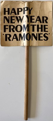 Lot 513 - THE RAMONES - HAPPY NEW YEAR ORIGINAL 1977 MINI SIGN.