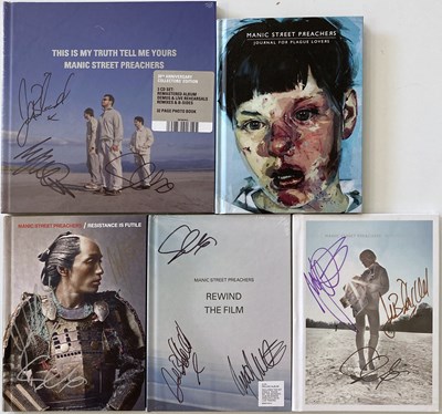 Lot 195 - MANIC STREET PREACHERS SIGNED DVDS / CD SET.