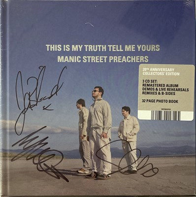 Lot 195 - MANIC STREET PREACHERS SIGNED DVDS / CD SET.