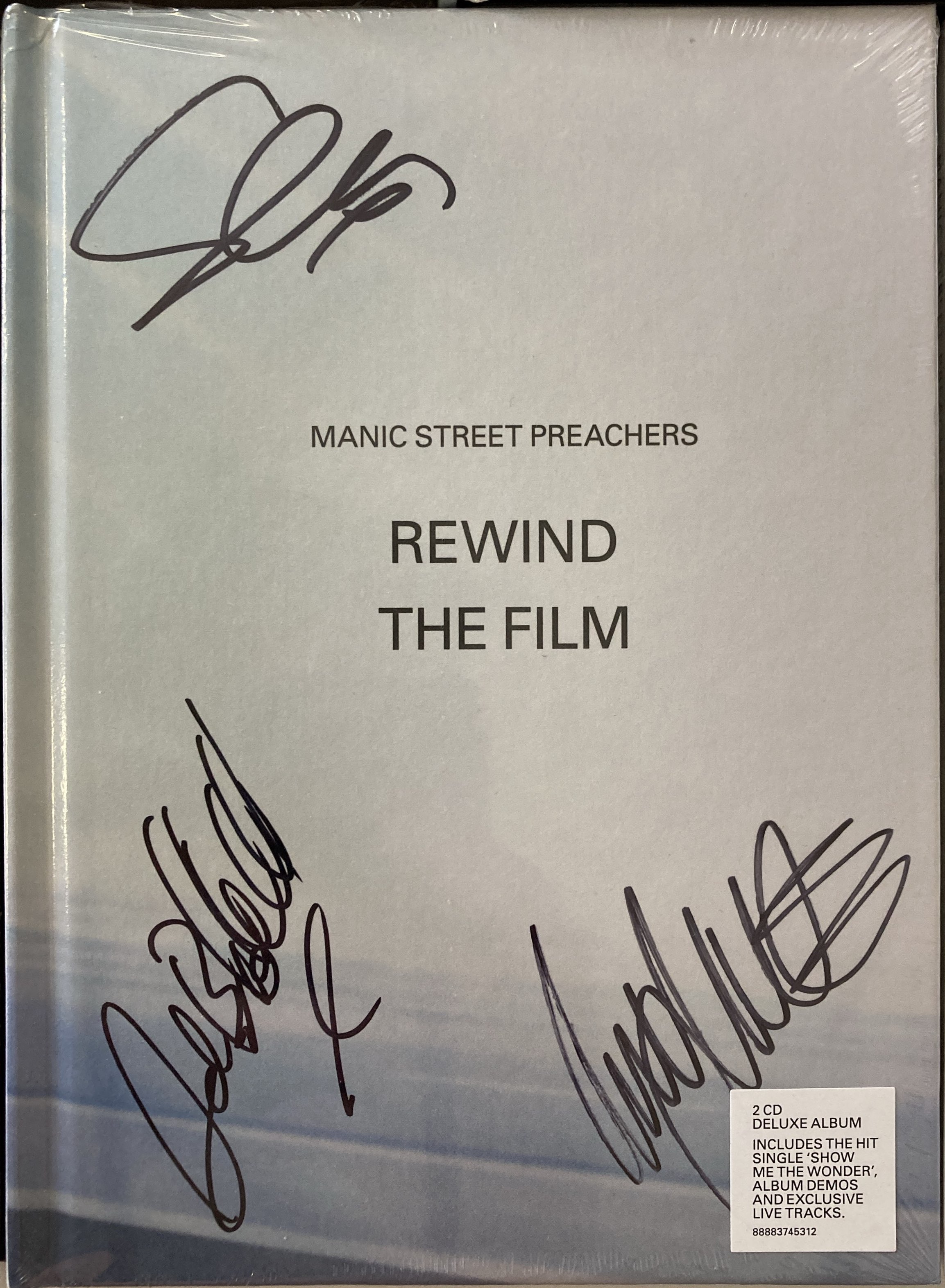 Lot 195 - MANIC STREET PREACHERS SIGNED DVDS / CD SET.