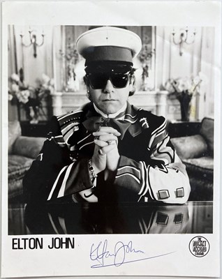 Lot 200 - ELTON JOHN SIGNED PHOTOGRAPH.