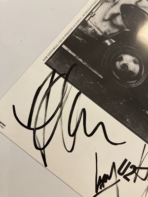 Lot 201 - FULLY SIGNED U2 PHOTOGRAPH.