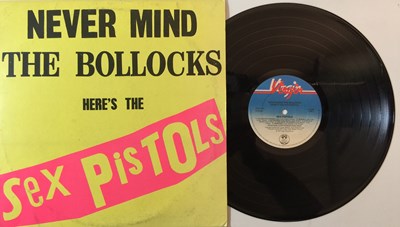 Lot 1050 - SEX PISTOLS - NEVER MIND THE BOLLOCKS LP PLUS PROMO CARTOON POSTER