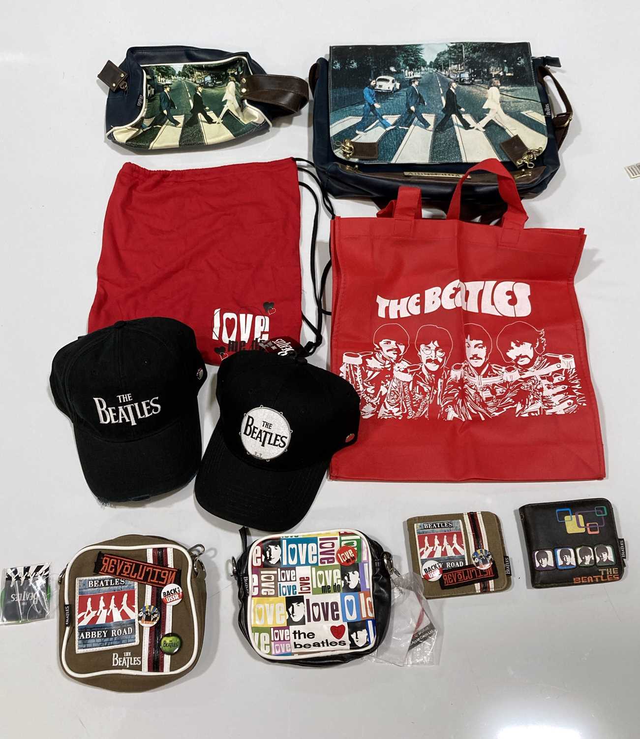 Lot 252 - THE BEATLES BAGS, WALLETS & HATS.