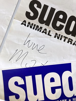 Lot 215 - SUEDE POSTERS INC TWO SIGNED.