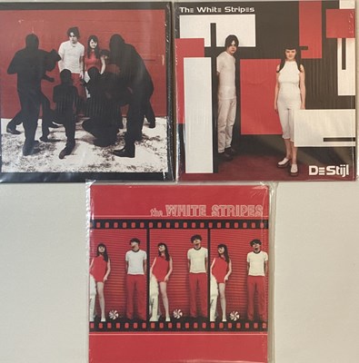 Lot 263 - THE WHITE STRIPES - FIRST THREE ALBUMS - LIMITED RED/WHITE SPLIT VINYL COPIES