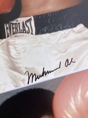 Lot 133 - MUHAMMAD ALI SIGNED PHOTOGRAPHS.