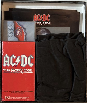 Lot 334 - AC/DC - THE RAZORS EDGE - AUSTRALIAN TOUR SOUVENIR BOX SET (CASSETTE/VHS)