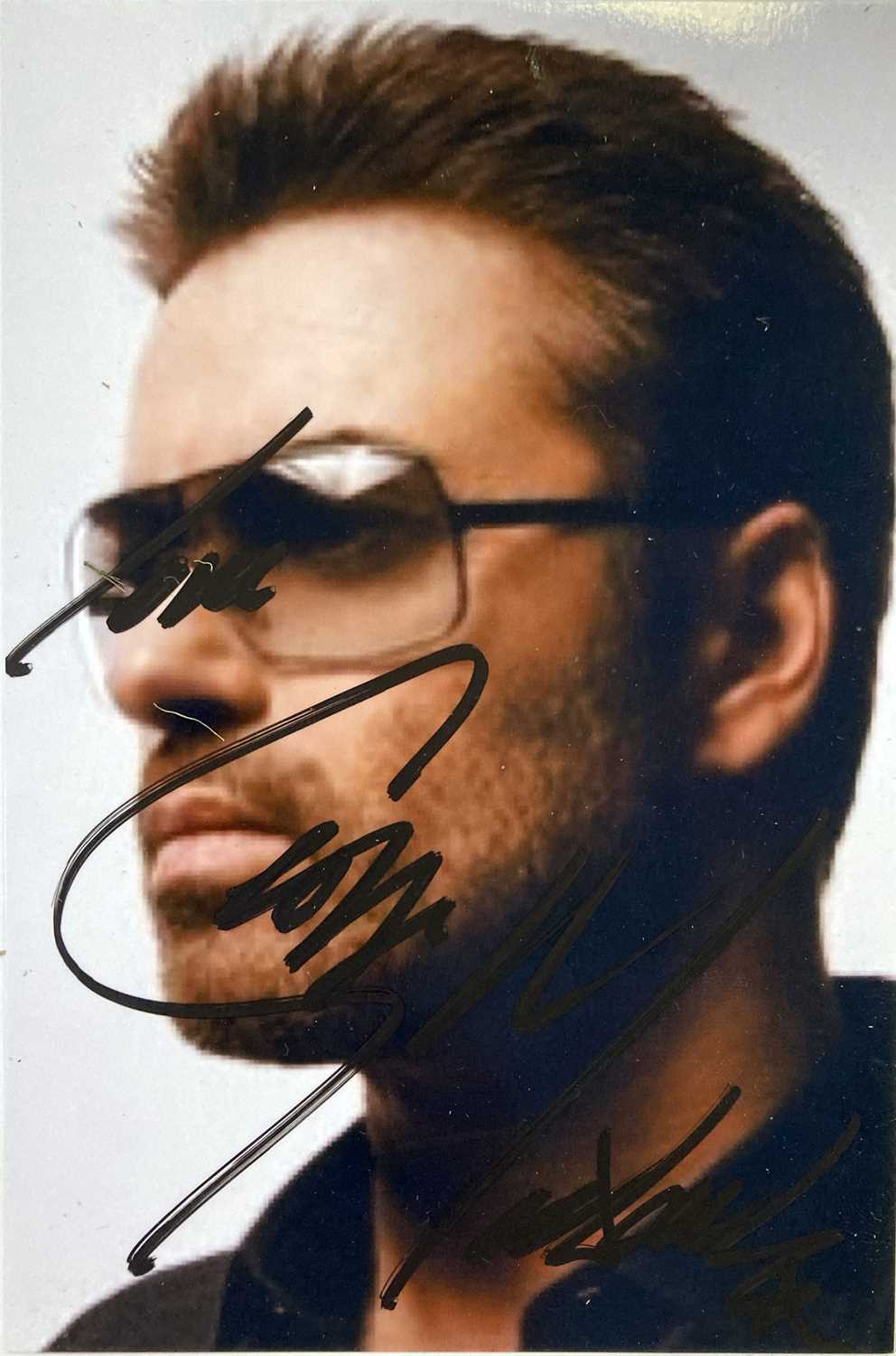 Lot 346 - GEORGE MICHAEL SIGNED PHOTOGRAPH.