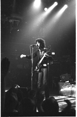 Lot 147 - THIN LIZZY - 1977 PHOTO NEGATIVES WITH COPYRIGHT PLUS POSTER.