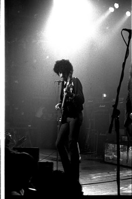 Lot 147 - THIN LIZZY - 1977 PHOTO NEGATIVES WITH COPYRIGHT PLUS POSTER.