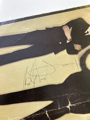 Lot 376 - THE JAM - TWO SIGNED 7" SINGLES.