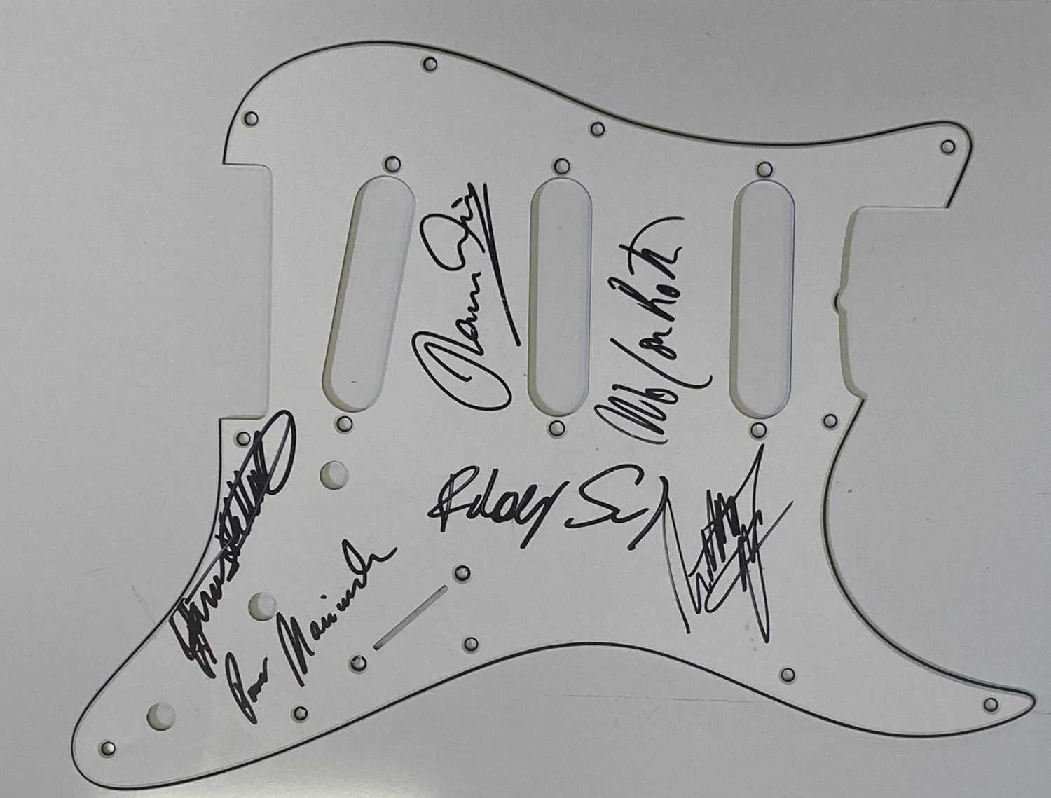 Lot 395 - A GUITAR SCRATCHPLATE SIGNED BY SCORPIONS.