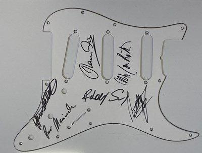 Lot 395B - A GUITAR SCRATCHPLATE SIGNED BY SCORPIONS.