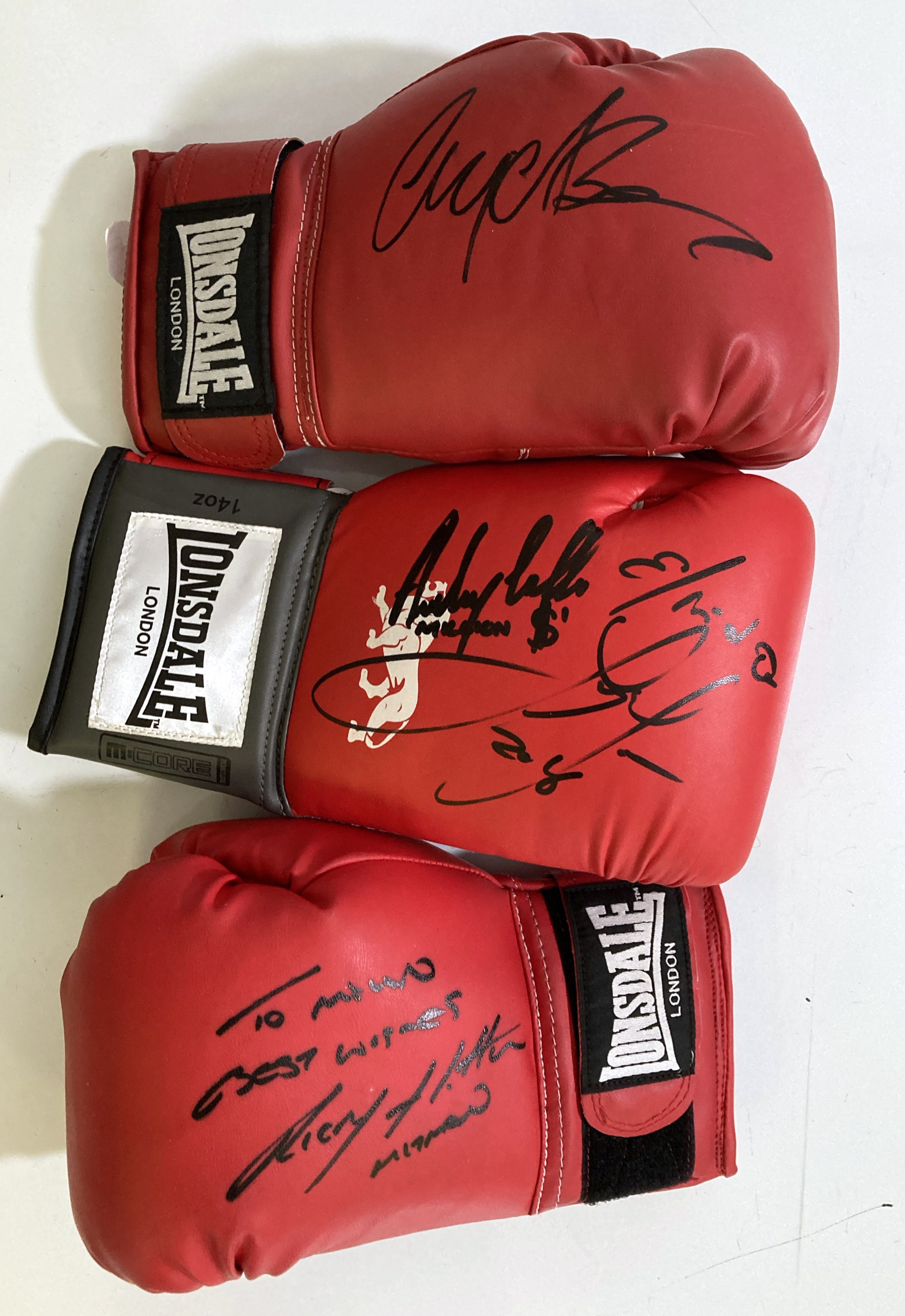 Lot 147 SIGNED BOXING GLOVES BELT HOLDERS.