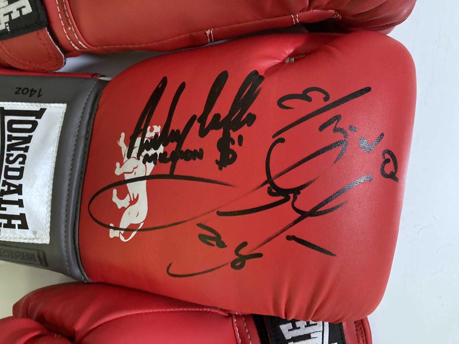 Lot 147 SIGNED BOXING GLOVES BELT HOLDERS.