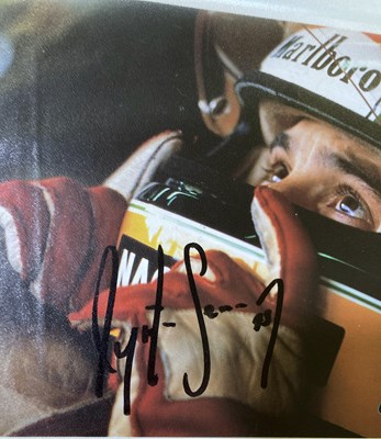 Lot 187 - FORMULA ONE - AYRTON SENNA PHOTOGRAPHS AND AUTOGRAPH.