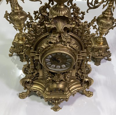 Lot 34 - FRENCH GILT CLOCK AND MATCHING CANDELABRAS