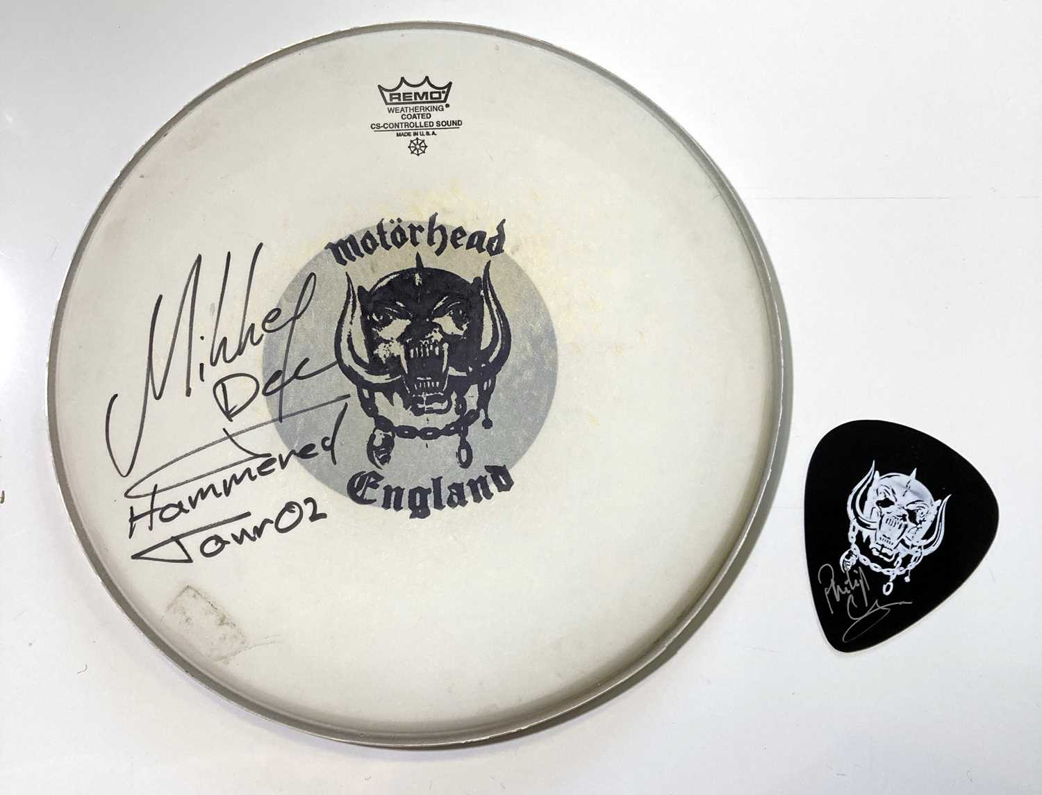 Lot 194 - MOTORHEAD SIGNED DRUM SKIN.