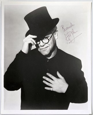 Lot 205 - ELTON JOHN - A SIGNED PHOTOGRAPH.