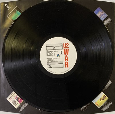 Lot 454 - U2 - WAR - A SIGNED LP.