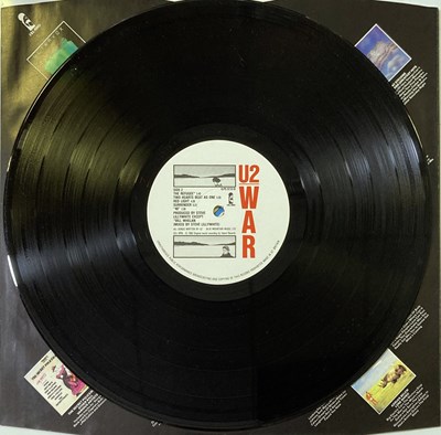 Lot 454 - U2 - WAR - A SIGNED LP.