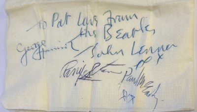 Lot 225A - THE BEATLES - A SIGNED NAPKIN.