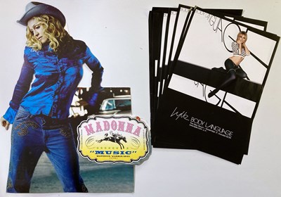 Lot 234 - KYLIE MINOGUE POSTERS & MADONNA SHOP DISPLAY.