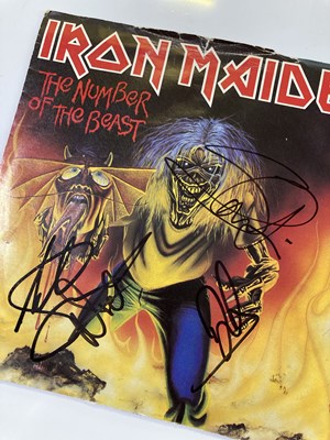 Lot 355 - IRON MAIDEN SIGNED ITEMS.