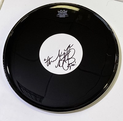 Lot 373 - THE ROLLING STONES - DRUM SKIN SIGNED BY CHARLIE WATTS.