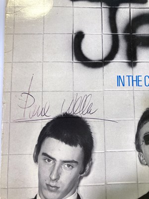 Lot 313 - THE JAM - IN THE CITY SIGNED BY PAUL WELLER / BRUCE FOXTON.