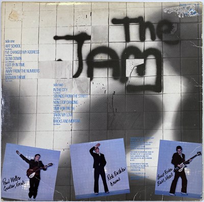 Lot 313 - THE JAM - IN THE CITY SIGNED BY PAUL WELLER / BRUCE FOXTON.