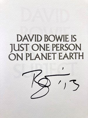 Lot 240 - DAVID BOWIE IS - A SIGNED COPY.