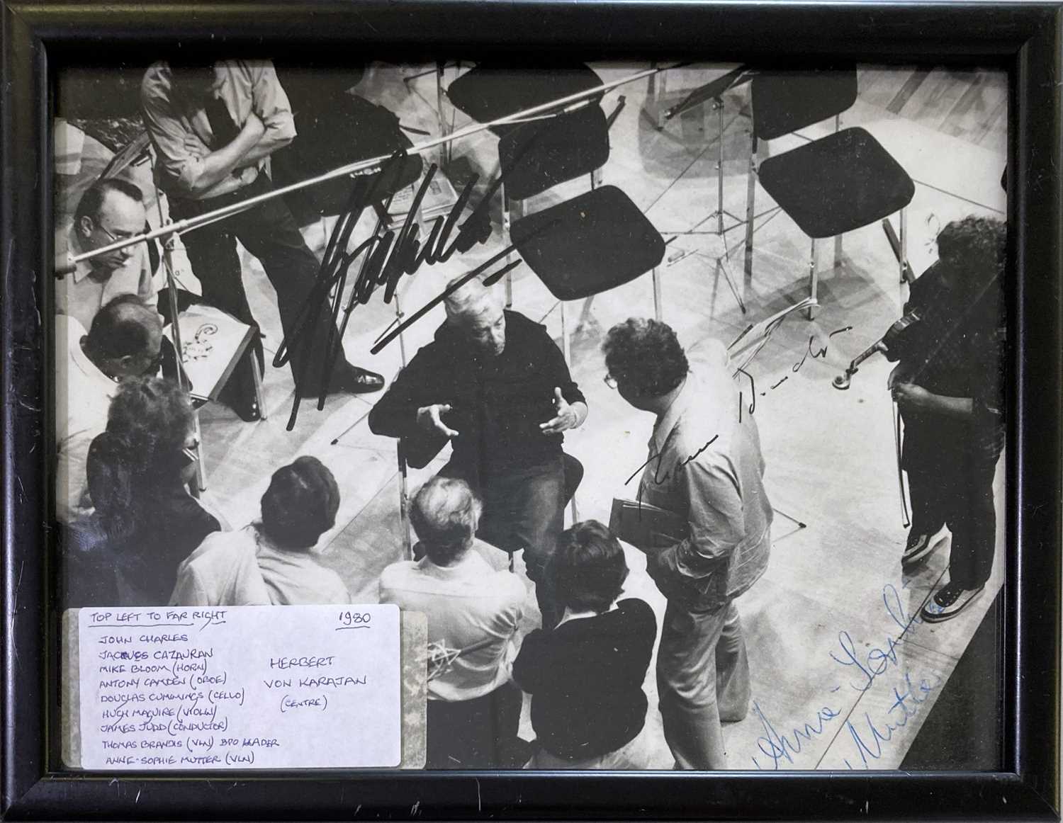 Lot 324 - HERBERT VON KARAJAN - A SIGNED PHOTO.