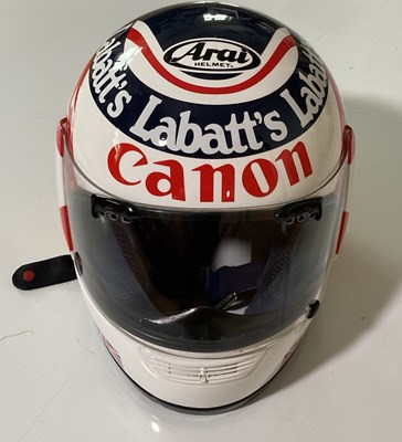 Lot 16 - NIGEL MANSELL - SIGNED LIMITED EDITION PRINT AND REPRODUCTION HELMET.