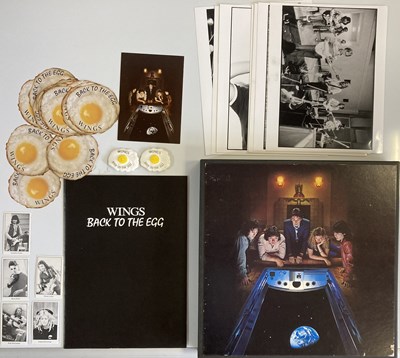 Lot 129 - WINGS BACK TO THE EGG BOX SET PROMOTIONAL ITEMS