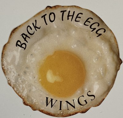 Lot 129 - WINGS BACK TO THE EGG BOX SET PROMOTIONAL ITEMS