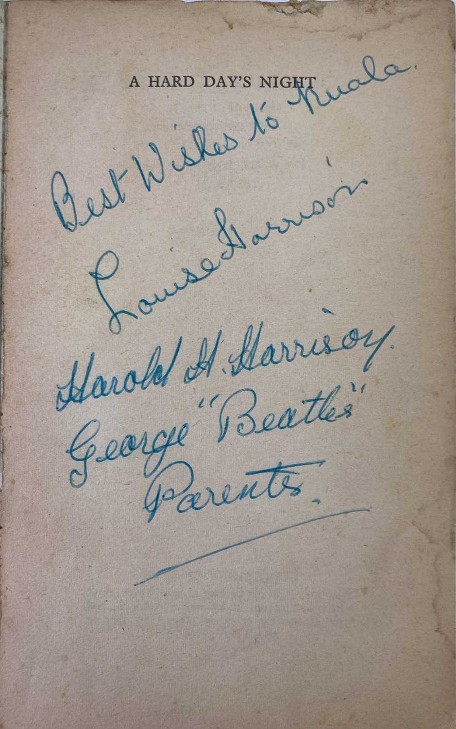 Lot 531 - HARD DAY'S NIGHT PAPERBACK BOOK SIGNED BY GEORGE HARRISON'S PARENTS.