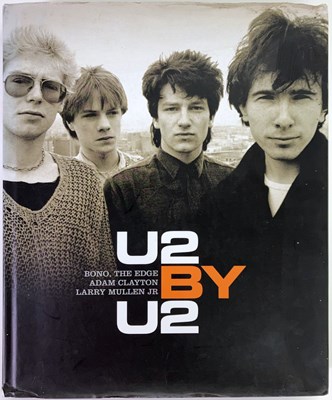 Lot 321 - U2 - SIGNED BOOK.