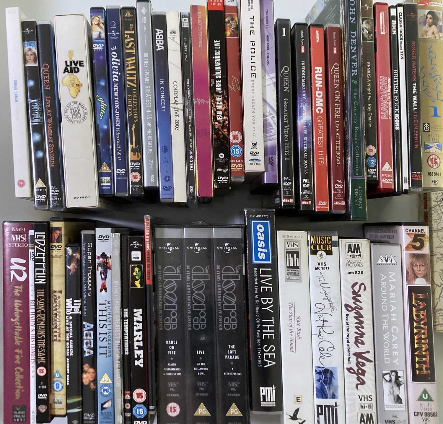 Lot 92 - MUSIC RELATED VHS & DVDS.