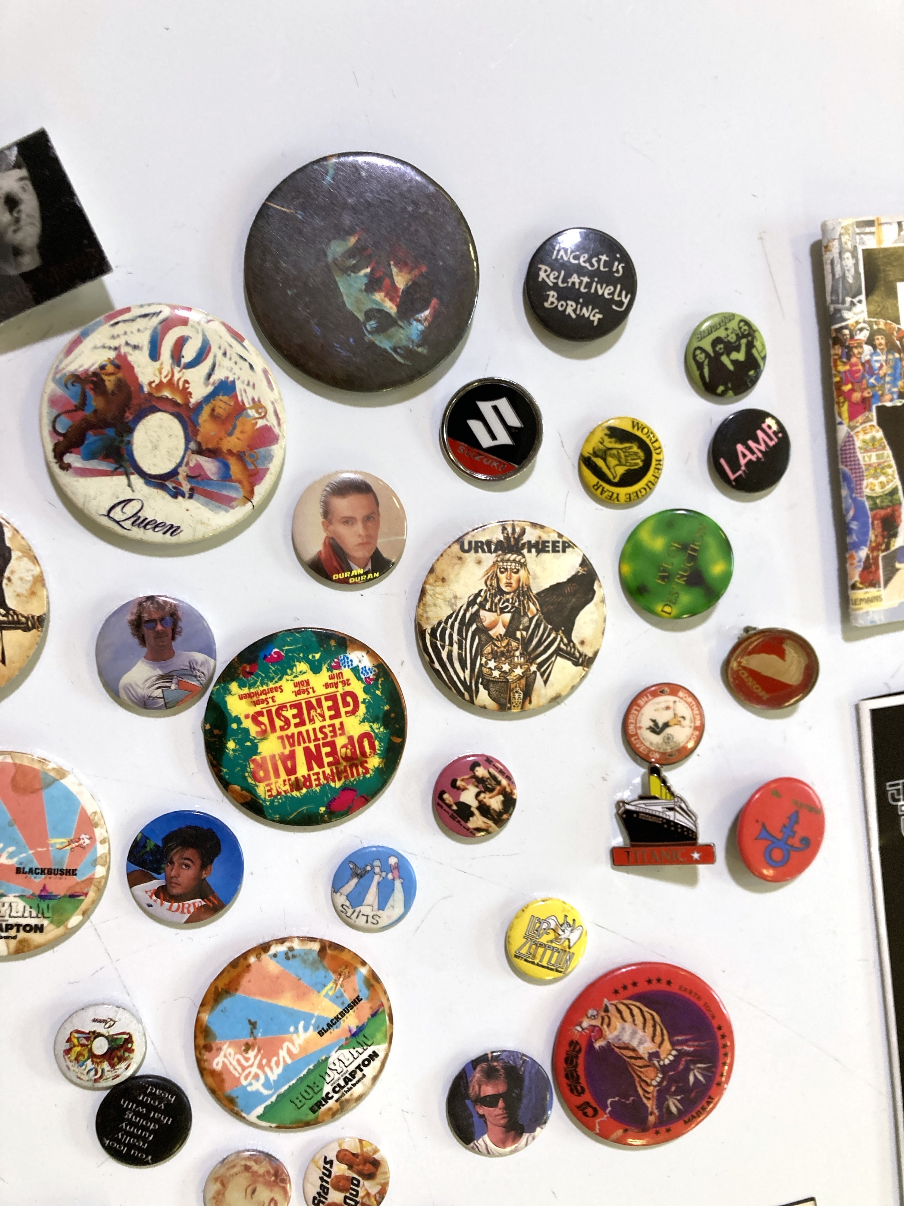 Lot 110 - CONCERT EPHEMERA - BADGES, TICKETS, T-SHIRTS.